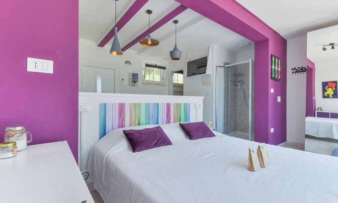 Lacona Appartement | Appartamento Mirtillo avec espaces extérieurs et Wi-Fi