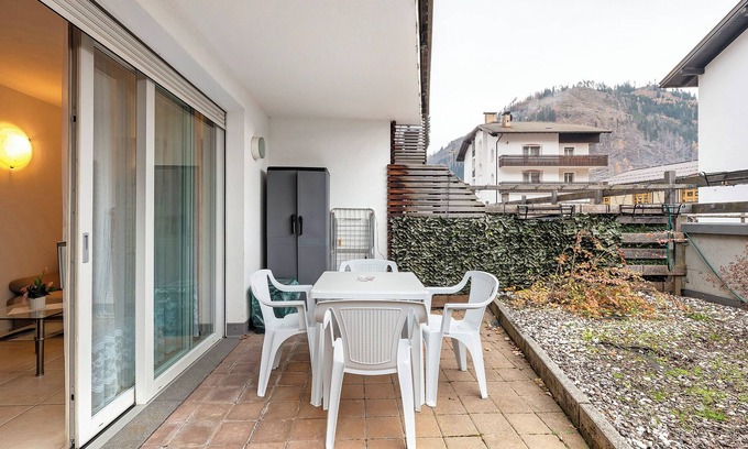 Predazzo Appartement | Appartement "Night and Day 4" avec vue sur les montagnes, balcon et Wi-Fi.