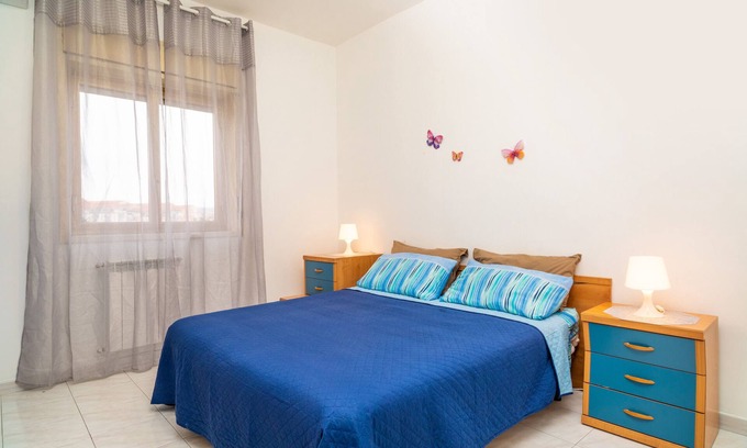San Giorgio-Librino-San Giuseppe la Rena-Zia Lisa-Villaggio Sant'Agata Appartement | Appartement 'Nigido Holiday Houses Simona' avec vue sur mer, Wi-Fi et climatisation