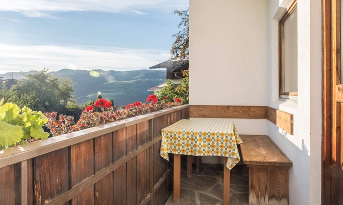 Fie allo Sciliar Appartement | Appartement "Peterbühl" dans un paysage pittoresque avec vue sur les montagnes, balcon et jardin