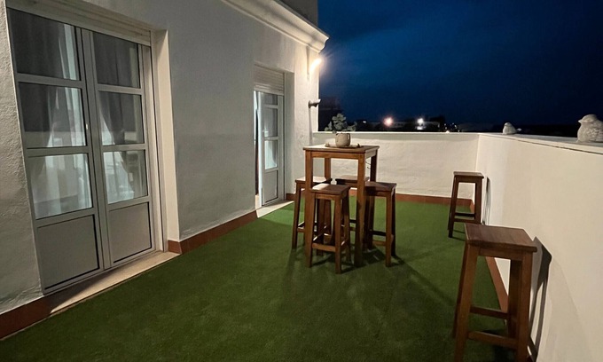 Pilas Appartement | Appartement 'Pilas' avec piscine partagée, Wi-Fi et climatisation