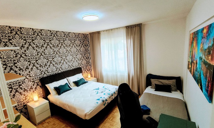 Camin Appartement | Appartement "Résidence royale" avec jardin partagé, Wi-Fi et climatisation
