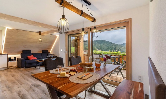 Wolfach - Saint Roman Appartement | Appartement "Schwarzwaldblick" avec vue sur les montagnes, jardin partagé et Wi-Fi
