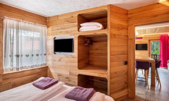 Pie Falcade Appartement | Apartment 'Tana Del Picchio Rosso' with Mountain View, Shared Garden and Wi-Fi