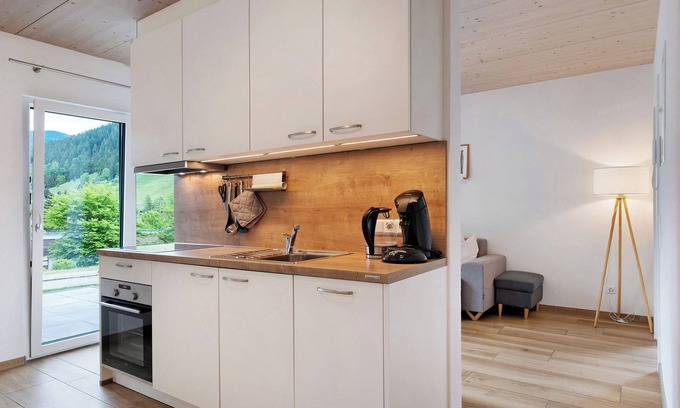 Aftersteg Appartement | Appartement "Wanderlust" avec vue sur les montagnes, terrasse privée et Wi-Fi