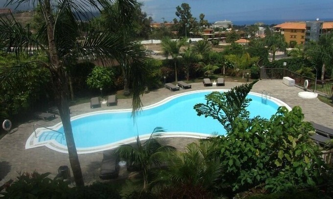 Puerto de la Cruz Appartement | Appartement avec vue sur la mer et le Teide, avec 2 terrasses, piscine et beaux jardins