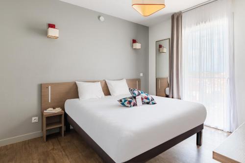 Saint-Assiscle Appartement | Appart'City Confort Perpignan Centre Gare