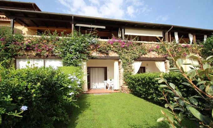 Porto San Paolo Appartement | Appartamento a Pochi Passi dal Mare con Patio e Giardino Privato