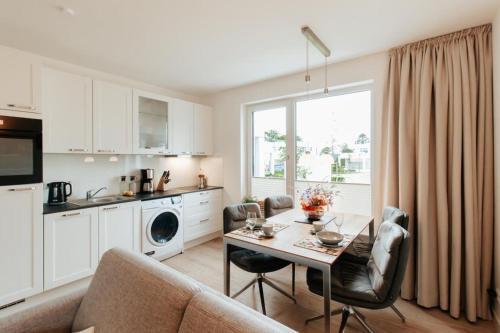 Lohme Appartement | Appartement Kranich - Moderne Ferienwohnung direkt am Schloss Ranzow!