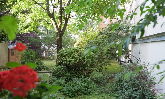 Batignolles Appartement | Appt + terrasse sur jardin 4 personnes face métro et parc Luther king