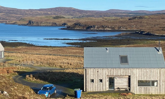 Skinidin Maison | Architect designed eco house with stunning loch and Mountain Views