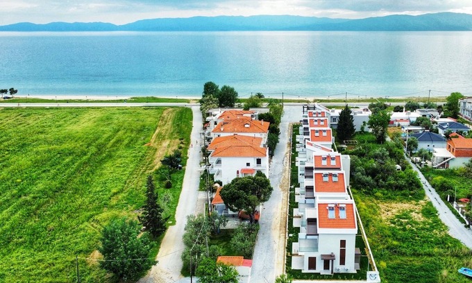 Paralia Ofryniou Villa | Three - Bedroom Triplex with Garden in Argilos Residential Complex
