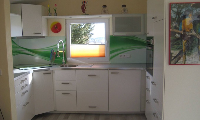 Brakel Maison | Maison de vacances atrium dans le vert pour "deux", pignon en verre, terrasse en verre, Weserbergland