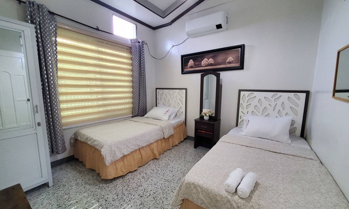 Tayug Maison | AVE Homes D- 2 BDRMS, Parking, A/C, WiFi, Netflix