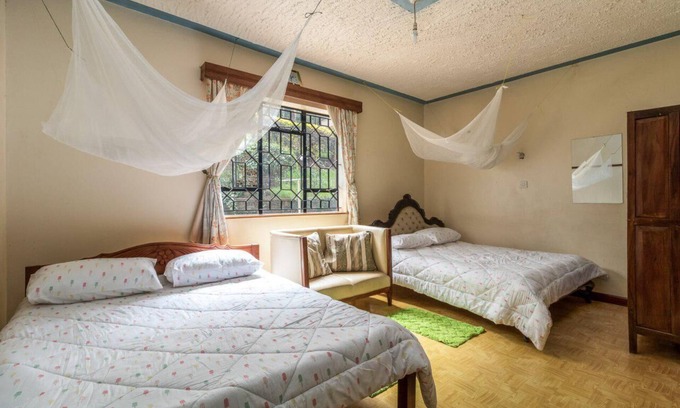 Ngong Maison | Azima Wellness Retreat Centre. Chambre partagée - 2 lits.