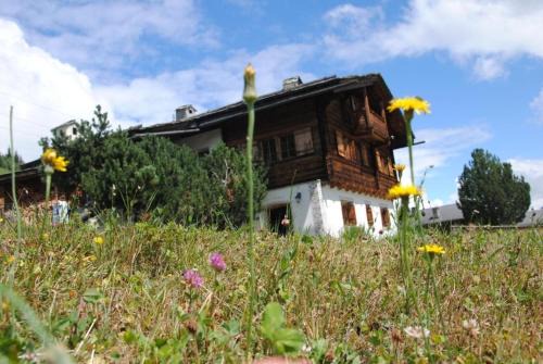 Disentis Maison | Bündnerchalet im Herz der Schweizer Alpen