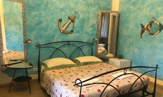 Rho Lit Et Petit-Déjeuner | B&B Oasis Passion Fiera - Chambre Quadruple