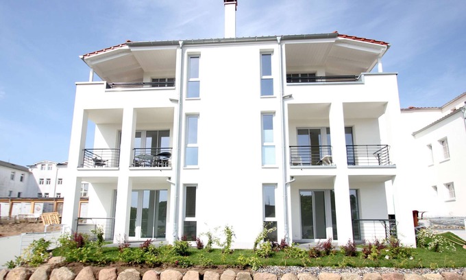 Gohren Appartement | Balcony, own sauna, free use of the AHOI adventure pool - Villa Antje FeWo 10