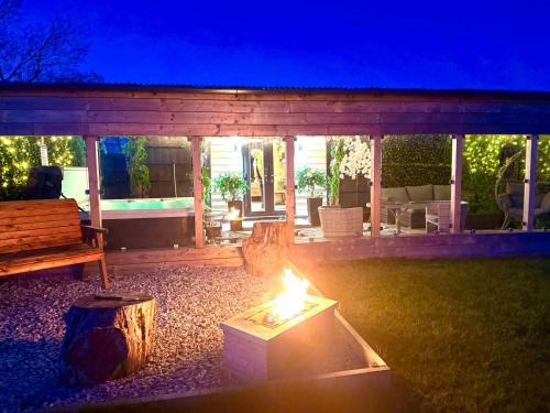 Cronberry Maison | Barlosh kiloch Tpod Lodge, Ayrshire, elec jacuzzi, bbq, Firepit, indooroutdoor terrace with outdoor sofa, egg chair,dinning country views,etc very spacious inside and out