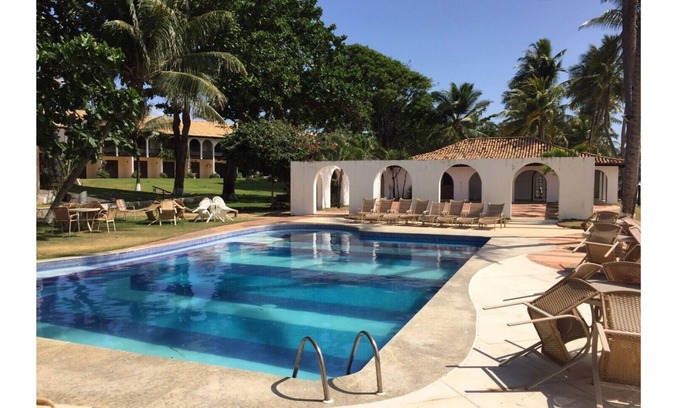 Praia do Forte Copropriété | Appartement en bord de mer avec 3 chambres et dans le village principal de Praia do Forte