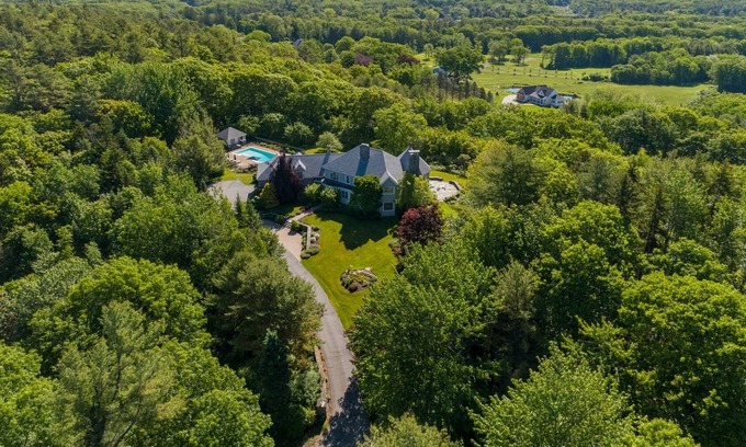Yarmouth Maison | Spacious four bedroom home with distant water views and a heated pool!