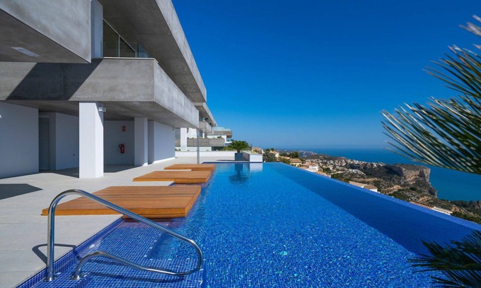 Cumbre del Sol Appartement | Confortable appartement avec piscine, climatisation, WIFI, TV, terrasse, vue panoramique et parking