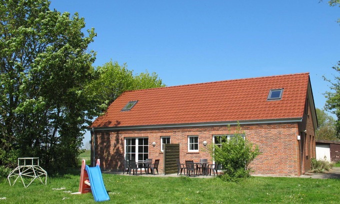 Bunde Maison | Agréable appartement dans une maison de vacances avec WIFI, TV, terrasse et animaux admis