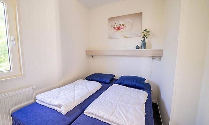 Biddinghuizen Maison | Belle maison de vacances privée pour 4 personnes avec piscine, WIFI, TV et terrasse