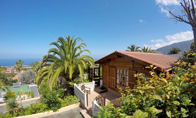 Las Arenas Maison | Belle maison en bois sur une finca calme entourée de palmiers
