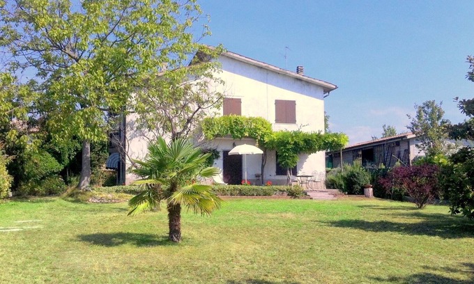 Tacconi Maison | Maison de vacances à Pastrengo avec jardin, terrasse et barbecue