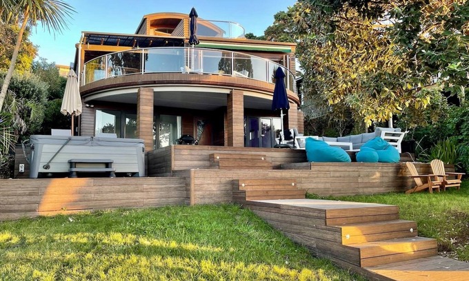Bayswater Maison | Waterfront paradise with stunning views, spa pool, and paddle boarding.