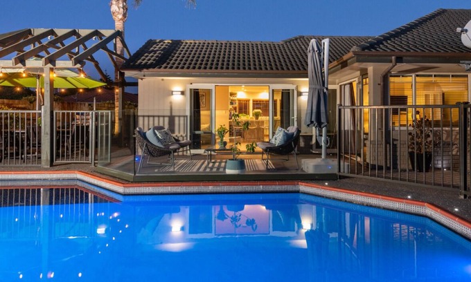 Papamoa Beach Maison | Better than a resort! Swimming pool, spa, pool-table. Walk to beach,shops,cafes.