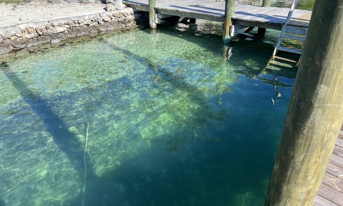 Treasure Cay Maison | Big Yellow House with Dock on Deep Water Canal and Dock Power Available