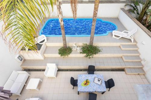 Il Monte Appartement | Bilocale Corso Italia 694 con piscina - Salento Reservation