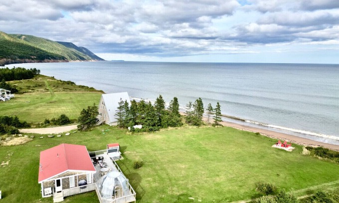 Aspy Bay Maison | Blissful Beachfront Bungalow. Beach- Hot tub & Sauna-All Weather Dome-Private