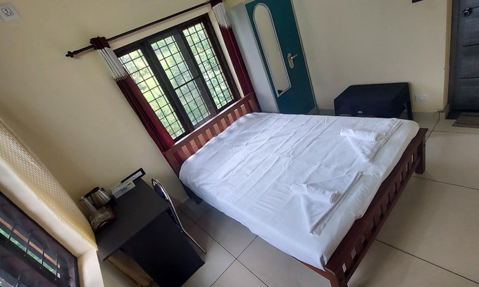 Mannarkkad Maison | Blue Hills View, a peaceful retreat nestled in the Attapadi mountains.