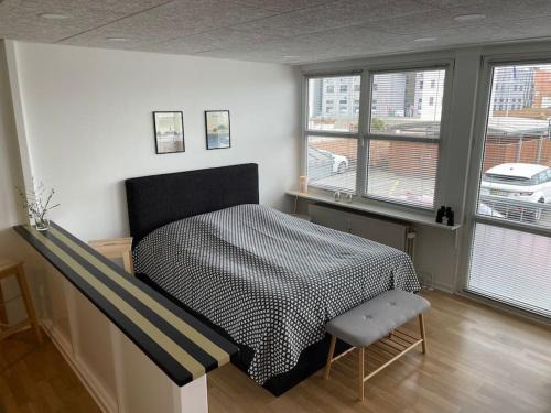 Randers Appartement | Bo i centrum med egen p-plads, 5G wifi og Apple TV