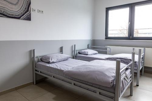 Hanau Appartement | BOARDINGHOUSE KAYSER Günstige Monteursunterkunft, Monteurwohnung in Hanau bei Frankfurt am Main und Aschaffenburg, KOSTENFREIE PARKPLÄTZE!