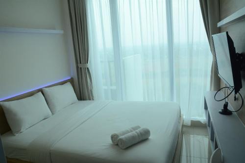 Serpong Appartement | Brand New Studio Tree Park City BSD Apartment near ICE BSD By Travelio