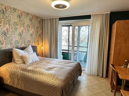 Greifenstein Maison | Brauner Bär mit Donaublick