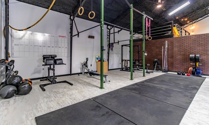 Tontitown Maison | Bricktown Barbell Loft