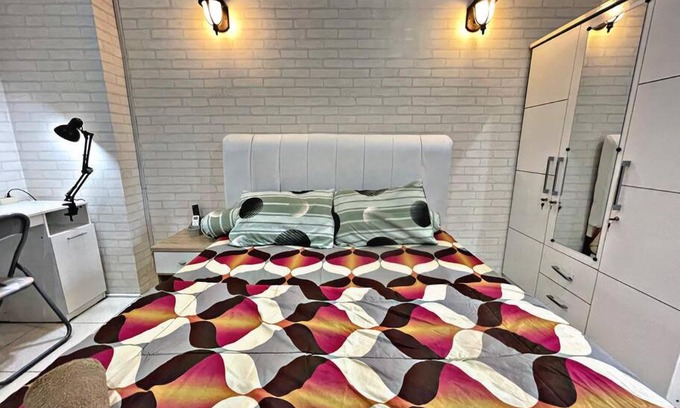 Pluit Appartement | Bright cozy studio 1BR Cityview, SmartTV,FAST Wifi at Greenbay Pluit