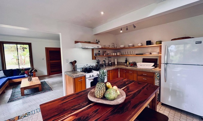 Rivas Maison | Bright Riverfront Home with Carport, Internet and Organic Gardens