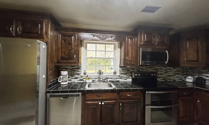 Douglas Maison | Bring the whole family to this great place with lots of room for everyone.