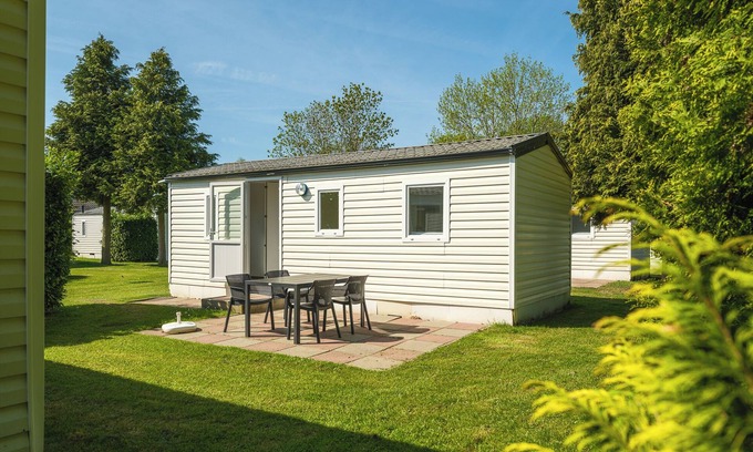 Terwolde Maison | Mobile home individuel pour quatre personnes, meublé simplement.