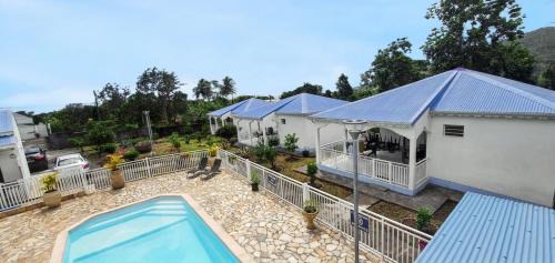 Capesterre-Belle-Eau Maison | Bungalow charmant à Capesterre-Belle-Eau avec piscine partagée