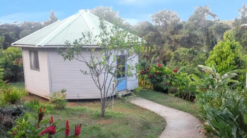 Le Robert Maison | Bungalow charmant au Robert avec piscine partagée