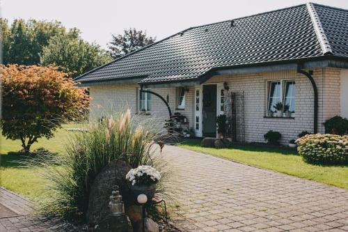 Lieme Maison | Bungalow mit Basketballplatz