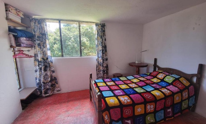 Teziutlan Lit Et Petit-Déjeuner | Cálida habitación en casa hogareña. Ambiente familiar.