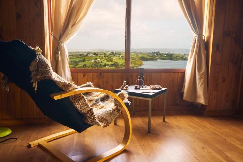 Ancud Maison | CABAÑA AZUL Y VERDE
